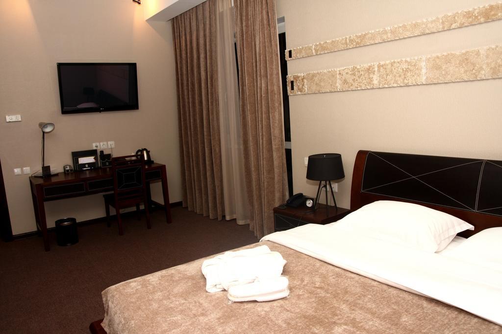 Grand M Hotel Navoi Szoba fotó