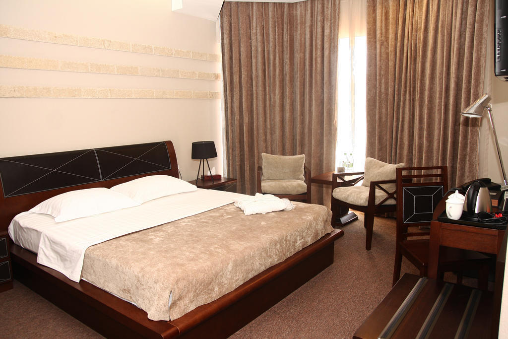 Grand M Hotel Navoi Szoba fotó