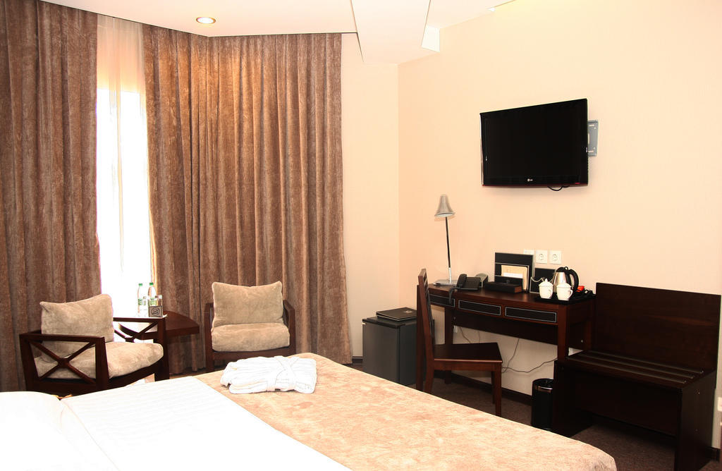 Grand M Hotel Navoi Szoba fotó