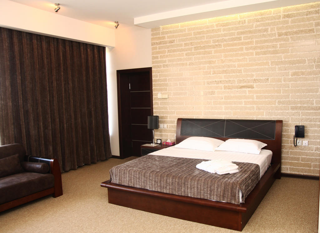 Grand M Hotel Navoi Szoba fotó